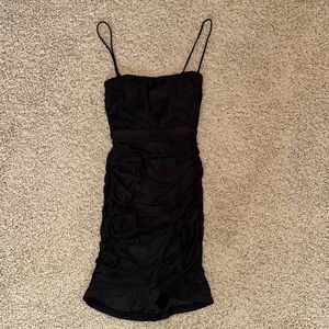 Lucky in the Sky mini black dress.